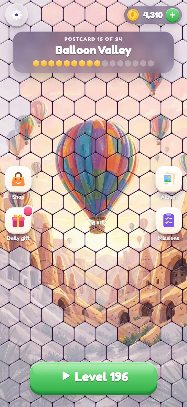 The home screen revealing a painted postcard of hot air balloons